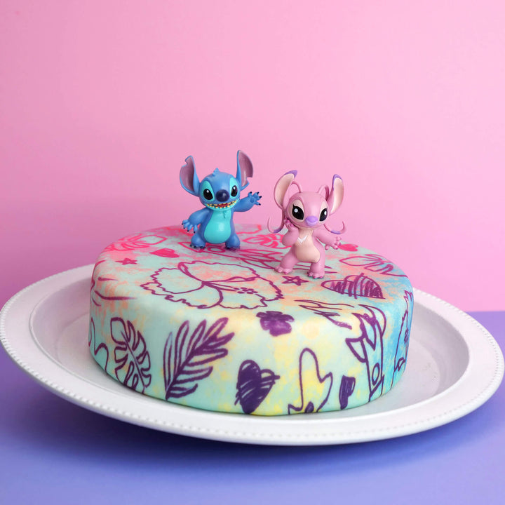 Angel &amp; Stitch® på tårta